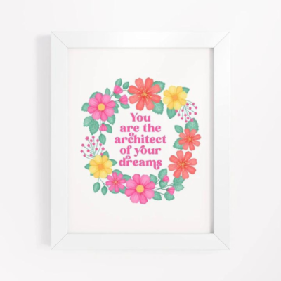 Motivational wall art with pink, orange and yellow floral wreath on white background with text: You are the architect of your dreams.