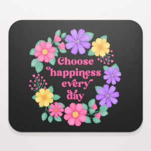 Motivational mouse pad with quote: Choose happiness every day. Text with purple, pink and yellow floral wreath with green leaves and foliage on black background.