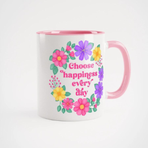 Motivational mug white and pink handle with quote: Choose happiness every day. Pink text with purple, pink and yellow floral wreath with green leaves and foliage.