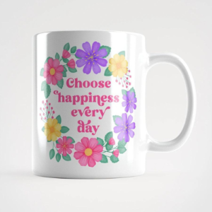 Motivational mug with quote: Choose happiness every day. Pink text with purple, pink and yellow floral wreath with green leaves and foliage.